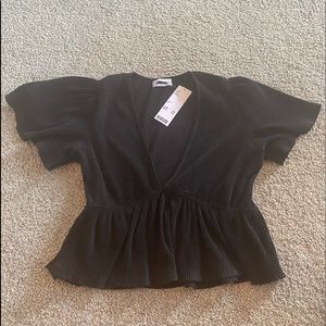 Black low-cut blouse